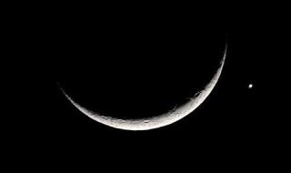 多地夜空上演金星伴月